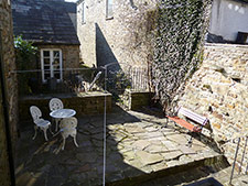 Patio to the Rear of Half Moon House Holiday Cottage